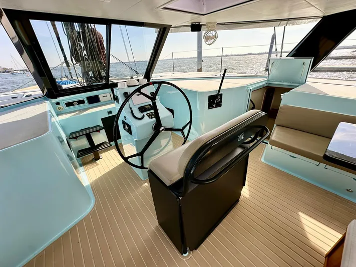 Starship Yacht Photos Pics Helm station of 2017 Gunboat 55 yacht with modern design and panoramic views.