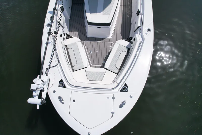  Yacht Photos Pics 2024 Blackfin 332 CC boat, aerial view of bow seating and deck on water.