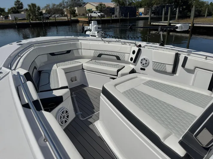  Yacht Photos Pics 2024 Blackfin 332 CC boat interior with luxurious seating and modern design.