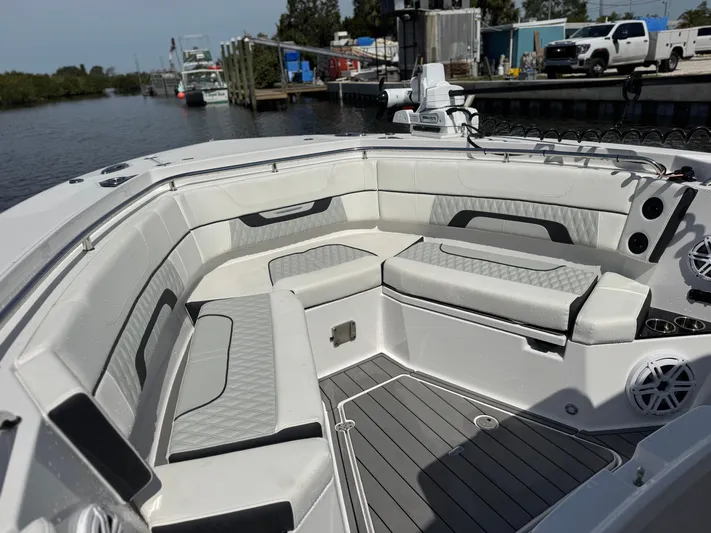  Yacht Photos Pics 2024 Blackfin 332 CC boat interior with spacious seating and modern design.