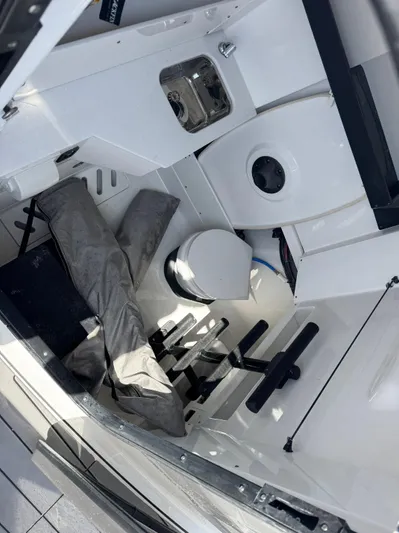  Yacht Photos Pics 2024 Blackfin 332 CC interior cabin with storage and seating area.