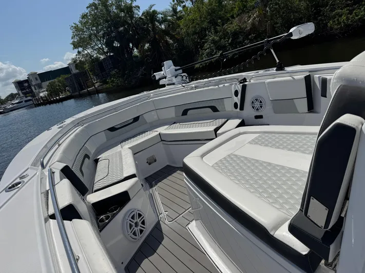  Yacht Photos Pics 2024 Blackfin 332 CC boat interior with luxurious seating and modern design.