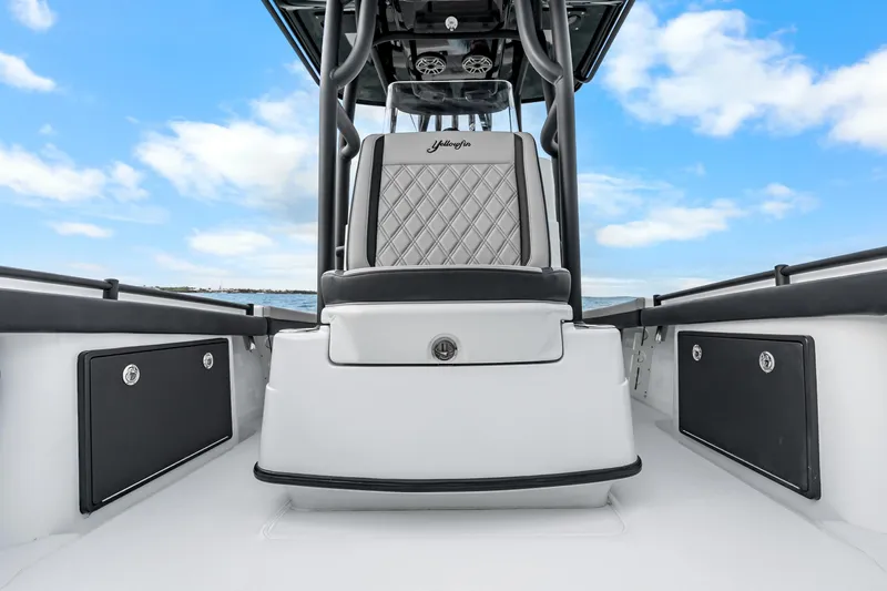  Yacht Photos Pics 2025 Yellowfin 26 Hybrid boat interior with sleek seating and storage compartments.
