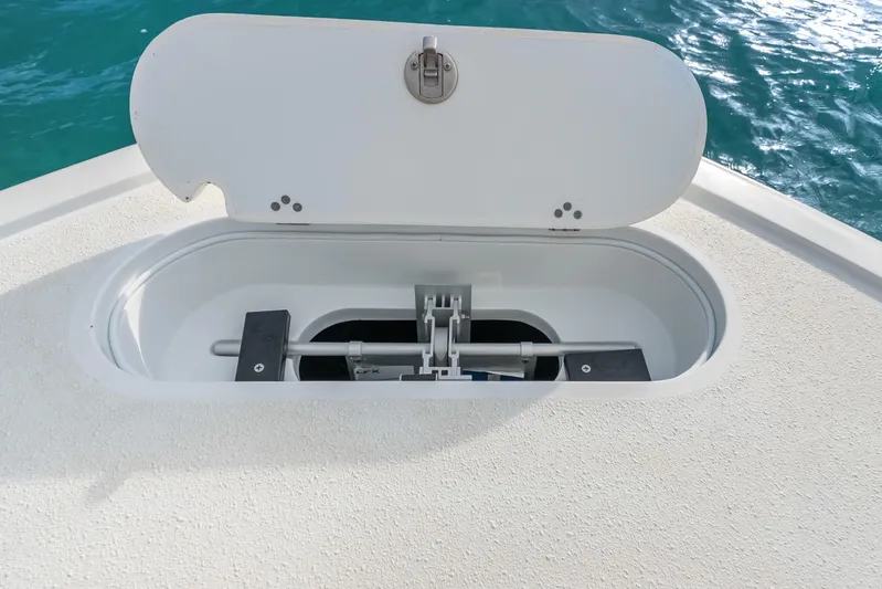  Yacht Photos Pics Open hatch on 2025 Yellowfin 26 Hybrid boat, revealing storage compartment.