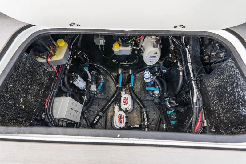  Yacht Photos Pics 2025 Yellowfin 26 Hybrid boat engine compartment with wiring and components.