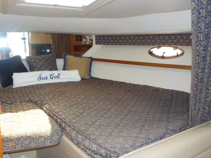 " Sea Goll " Yacht Photos Pics Luxurious cabin interior of 2003 Tiara Yachts 3100 Open with elegant bedding.