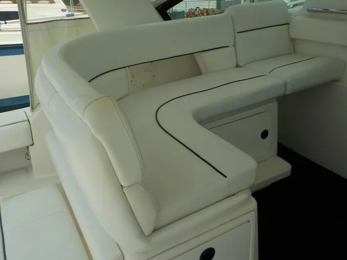 " Sea Goll " Yacht Photos Pics 2003 Tiara Yachts 3100 Open interior with white cushioned seating.