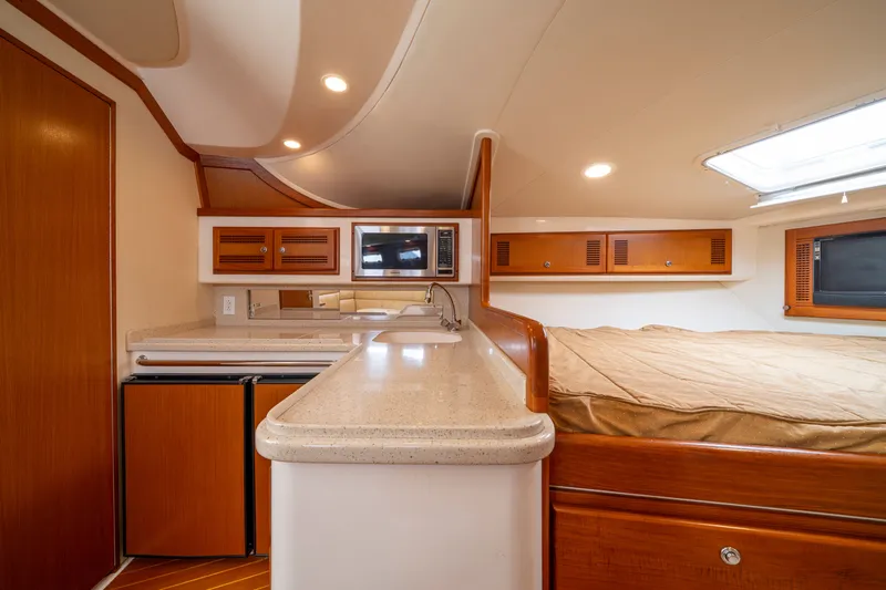  Yacht Photos Pics 2004 CABO 35 EXPRESS - Image 26