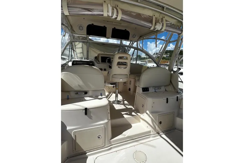  Yacht Photos Pics 2008 Grady-White Express 330 boat interior with helm and seating area.