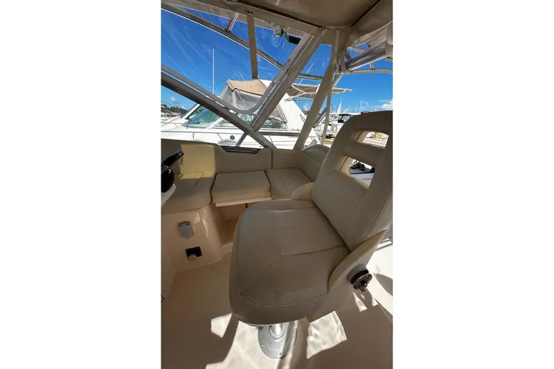  Yacht Photos Pics 2008 Grady-White Express 330 boat interior with beige seating and clear windows.