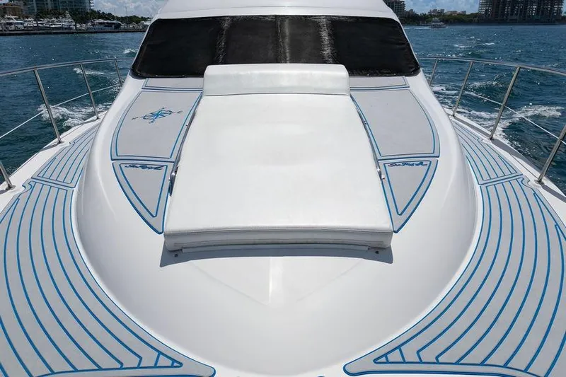 Lazy Days Yacht Photos Pics 2009 Sea Ray 44 Sedan Bridge yacht deck with sleek design and blue accents.