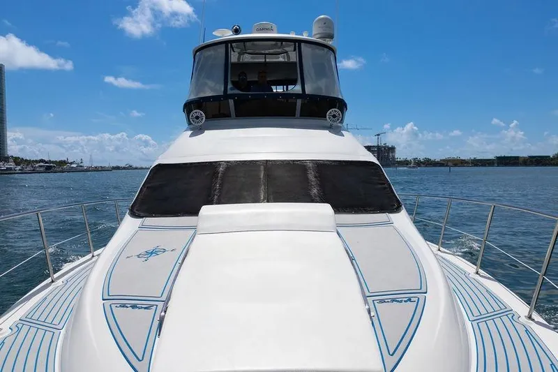 Lazy Days Yacht Photos Pics 2009 Sea Ray 44 Sedan Bridge yacht cruising on a sunny day.