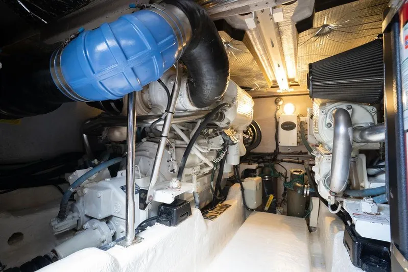 Lazy Days Yacht Photos Pics Engine room of 2009 Sea Ray 44 Sedan Bridge, showcasing mechanical components and systems.