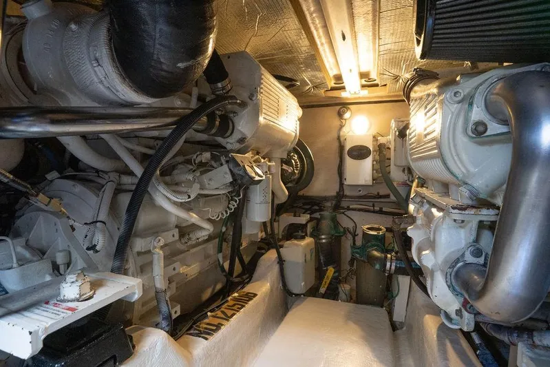 Lazy Days Yacht Photos Pics Engine room of 2009 Sea Ray 44 Sedan Bridge, showcasing mechanical components and systems.