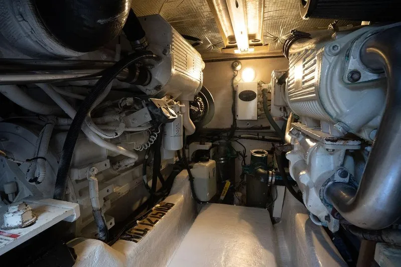 Lazy Days Yacht Photos Pics Engine room of 2009 Sea Ray 44 Sedan Bridge yacht, showcasing mechanical components.
