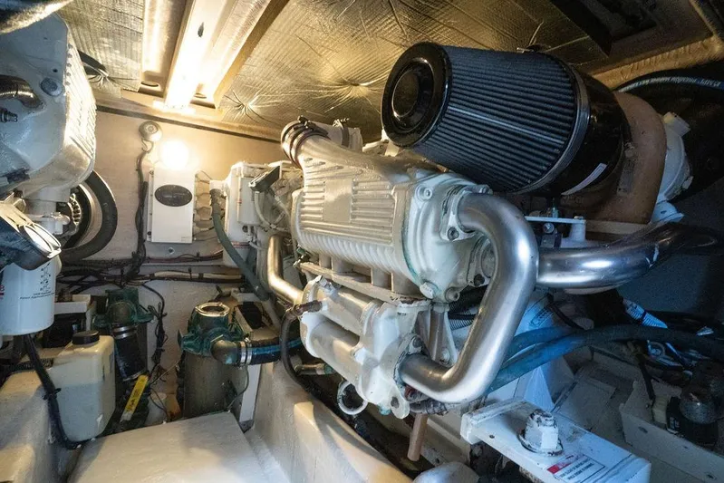 Lazy Days Yacht Photos Pics Engine room of 2009 Sea Ray 44 Sedan Bridge with visible components and lighting.