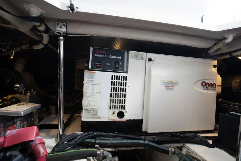 Lazy Days Yacht Photos Pics Engine room of 2009 Sea Ray 44 Sedan Bridge with Onan Marine Genset.