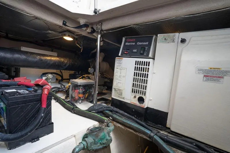 Lazy Days Yacht Photos Pics Engine room of 2009 Sea Ray 44 Sedan Bridge with Onan Marine Genset and battery.