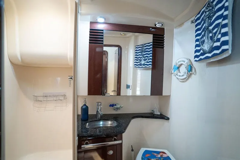 Lazy Days Yacht Photos Pics Luxurious bathroom in 2009 Sea Ray 44 Sedan Bridge yacht with nautical decor.