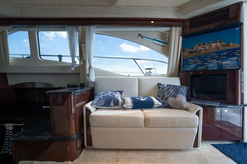 Lazy Days Yacht Photos Pics Luxurious interior of 2009 Sea Ray 44 Sedan Bridge yacht with elegant seating and decor.