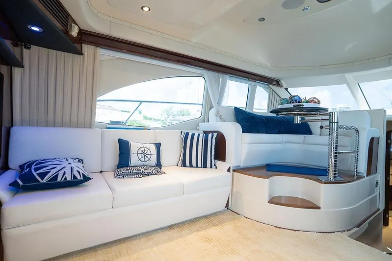 Lazy Days Yacht Photos Pics Luxurious interior of 2009 Sea Ray 44 Sedan Bridge yacht with elegant seating.