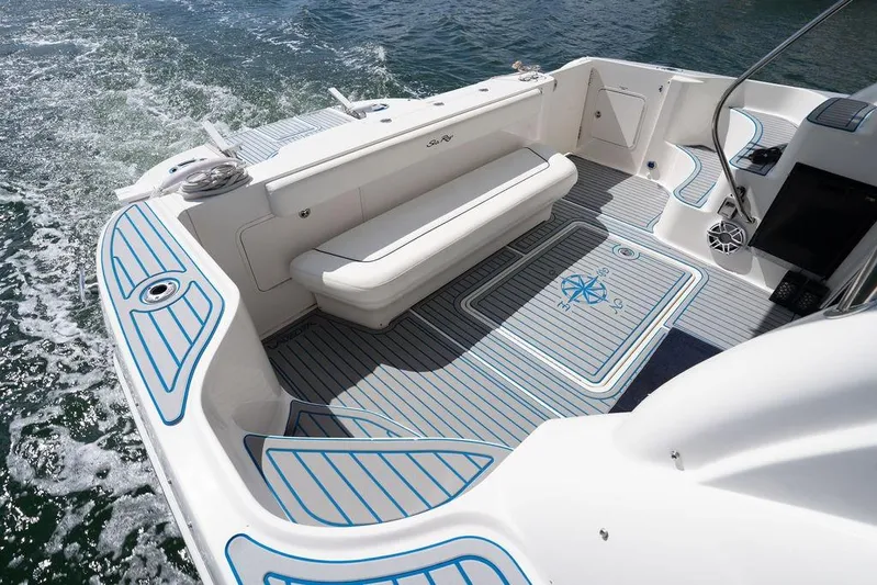Lazy Days Yacht Photos Pics 2009 Sea Ray 44 Sedan Bridge boat deck with seating and nautical design.