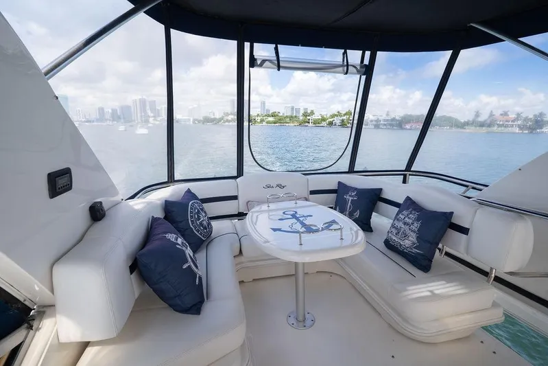 Lazy Days Yacht Photos Pics Luxurious 2009 Sea Ray 44 Sedan Bridge yacht interior with scenic ocean view.