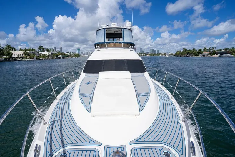 Lazy Days Yacht Photos Pics 2009 Sea Ray 44 Sedan Bridge yacht cruising on a sunny day.