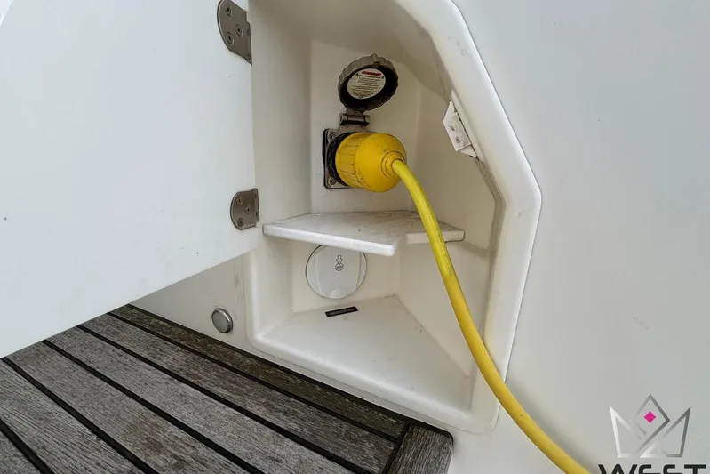 Albina Yacht Photos Pics Power connection on a 2018 Prestige 520 yacht with yellow cable.