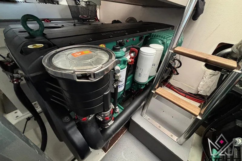 Albina Yacht Photos Pics Engine room of a 2018 Prestige 520 yacht, showcasing detailed machinery and components.