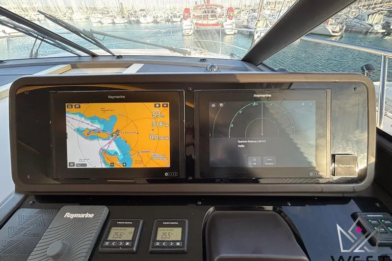 Albina Yacht Photos Pics Cockpit navigation system of 2018 Prestige 520 yacht with Raymarine displays.