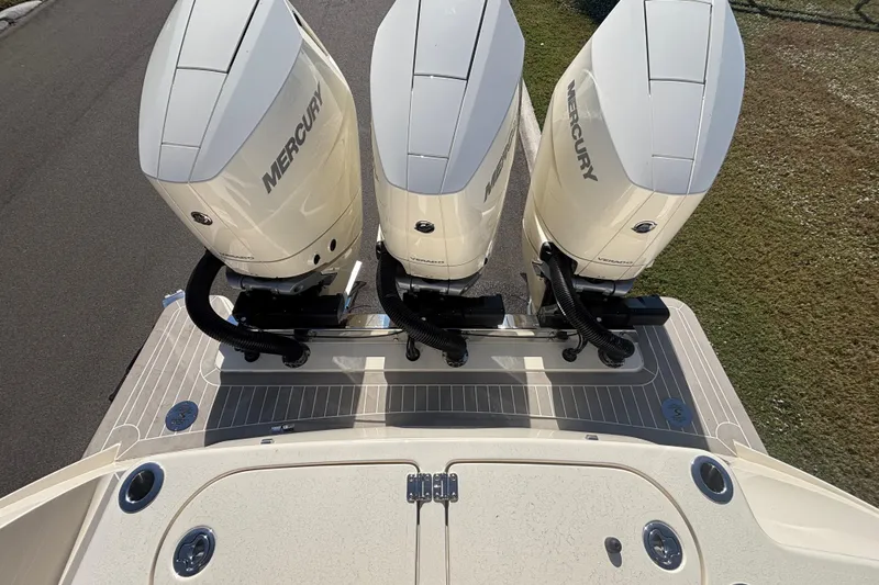 Yacht Photos Pics 2026 Scout 357 LXF boat with triple Mercury outboard engines, top view.