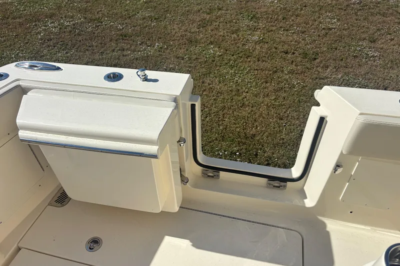  Yacht Photos Pics 2026 Scout 357 LXF boat deck with open transom door, showcasing sleek design.