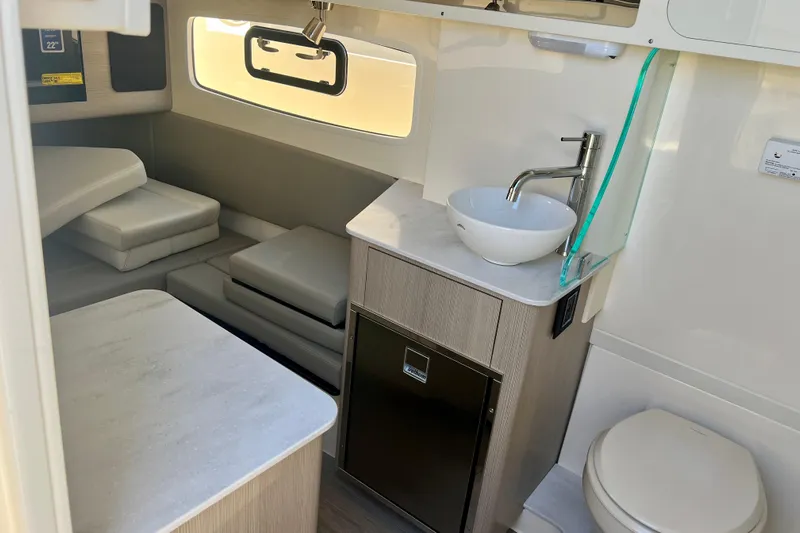  Yacht Photos Pics Interior of 2026 Scout 357 LXF boat with modern amenities and compact design.