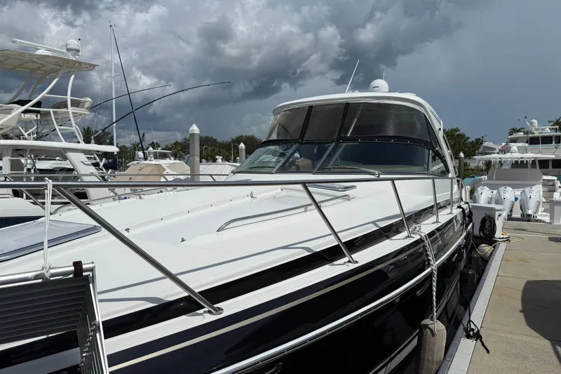 Another Six Pack Yacht Photos Pics 2016 Formula 37 Performance Cruiser docked at marina under cloudy sky.