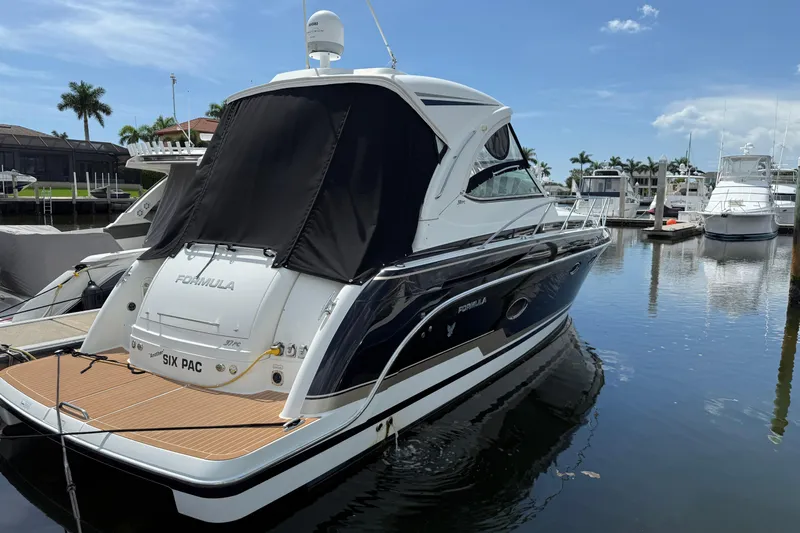 Another Six Pack Yacht Photos Pics 2016 Formula 37 Performance Cruiser docked at marina, rear view.