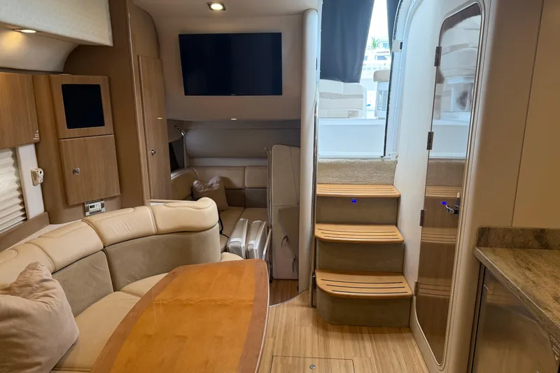 Another Six Pack Yacht Photos Pics Interior of 2016 Formula 37 Performance Cruiser with modern seating and wooden accents.