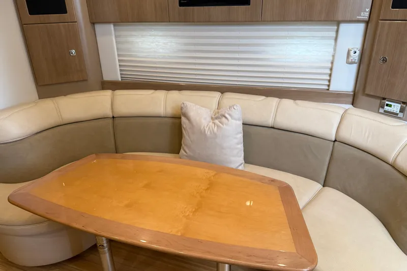 Another Six Pack Yacht Photos Pics Luxurious interior of 2016 Formula 37 Performance Cruiser with elegant seating and wooden table.