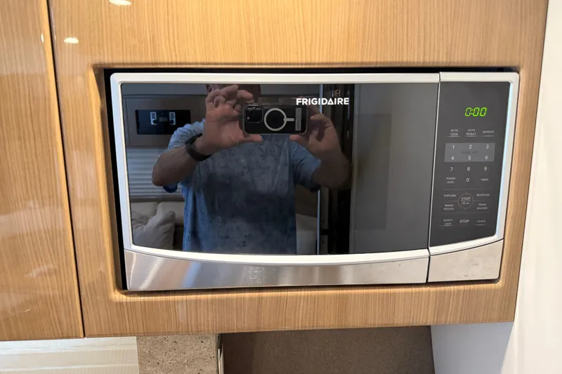 Another Six Pack Yacht Photos Pics Frigidaire microwave in 2016 Formula 37 Performance Cruiser kitchen area.
