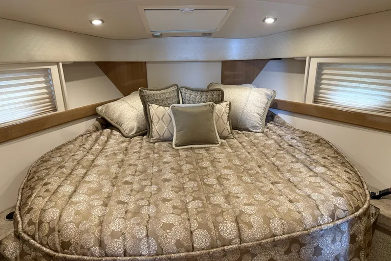Another Six Pack Yacht Photos Pics Luxurious cabin interior of 2016 Formula 37 Performance Cruiser with plush bedding and pillows.