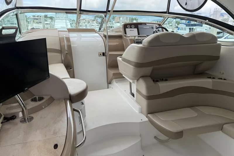 Another Six Pack Yacht Photos Pics Interior of a 2016 Formula 37 Performance Cruiser with beige seating and modern amenities.