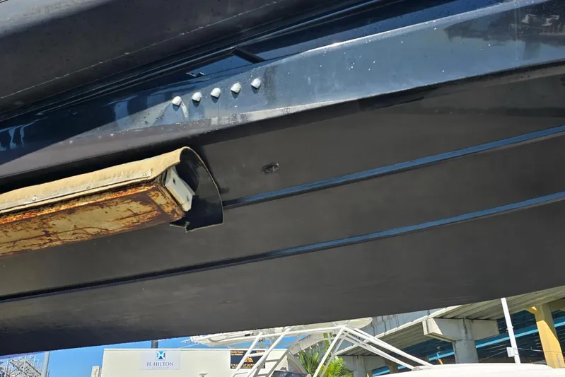 B-offline Yacht Photos Pics Underside view of a 2019 SACS Rebel 40 boat hull with visible wear.