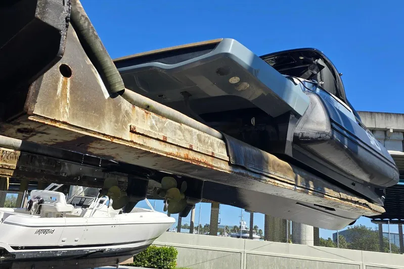 B-offline Yacht Photos Pics 2019 SACS Rebel 40 yacht on a lift, showcasing its sleek design and structure.