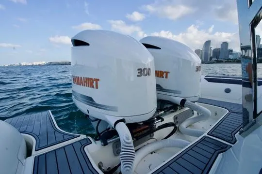  Yacht Photos Pics 2022 Brig Eagle 10 boat with dual outboard engines on the water.