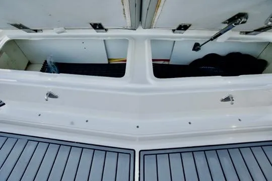  Yacht Photos Pics Storage compartments on a 2022 Brig Eagle 10 boat, featuring open hatches and visible interior.