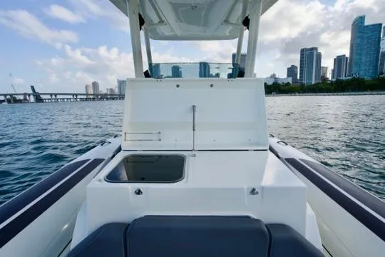  Yacht Photos Pics 2022 Brig Eagle 10 boat with city skyline and water view.
