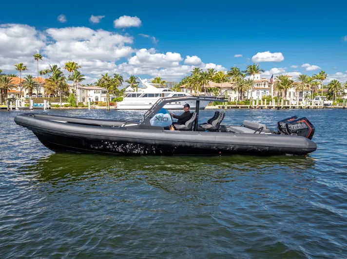  Yacht Photos Pics 2024 Goldfish X10 Scout boat on a sunny day in a marina.