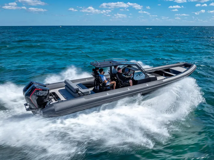  Yacht Photos Pics 2024 Goldfish X10 Scout boat cruising on the ocean.