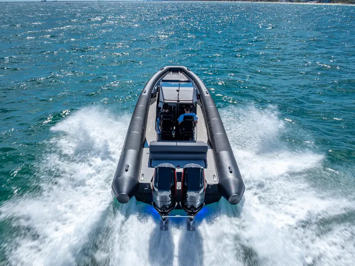  Yacht Photos Pics 2024 Goldfish X10 Scout boat speeding on open water.