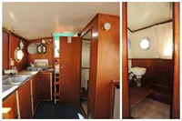 Interior of a 1958 custom boat with wooden kitchen and bathroom.